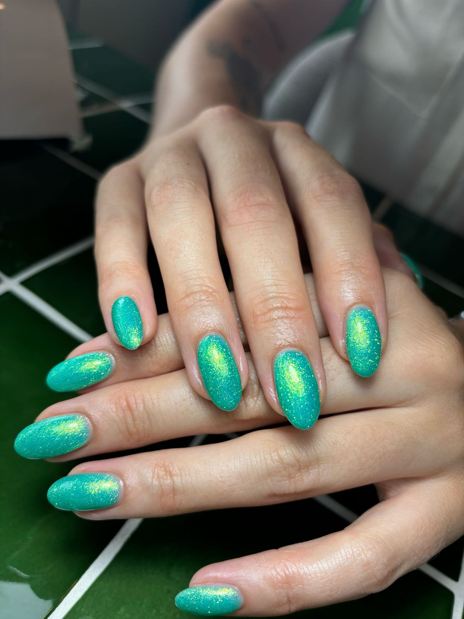 BIAB + Turquoise Gel Polish with Glitter Effect