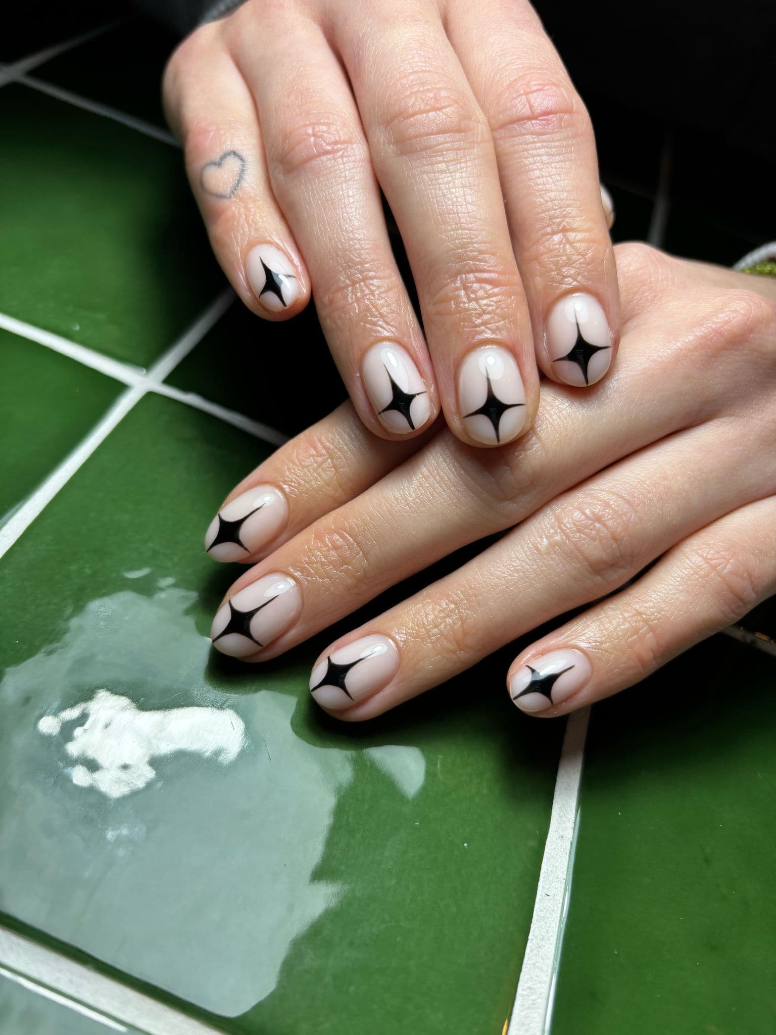 Level 2 Nail Art Black Stars on Light Base